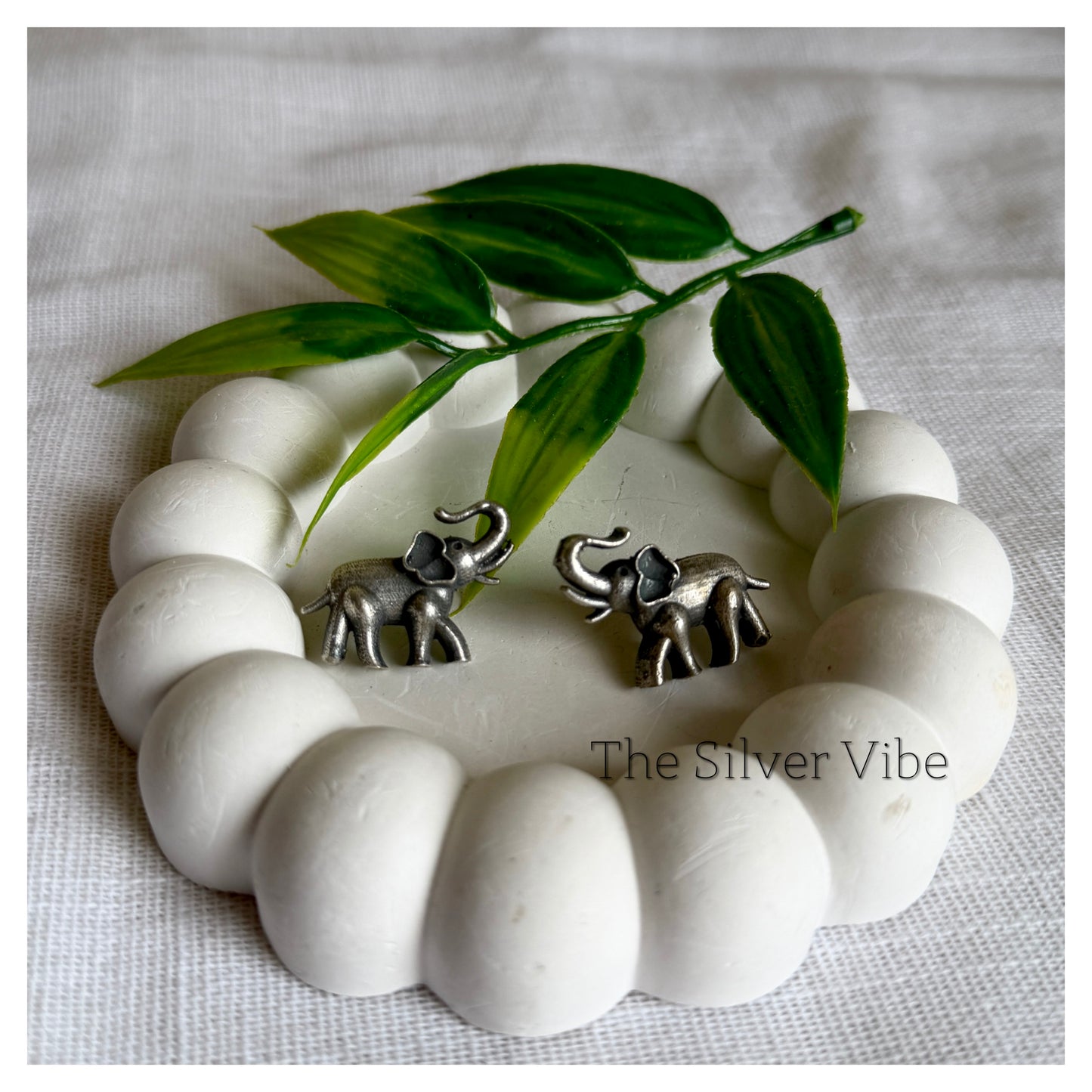 Black polished elephant studs TSV1044