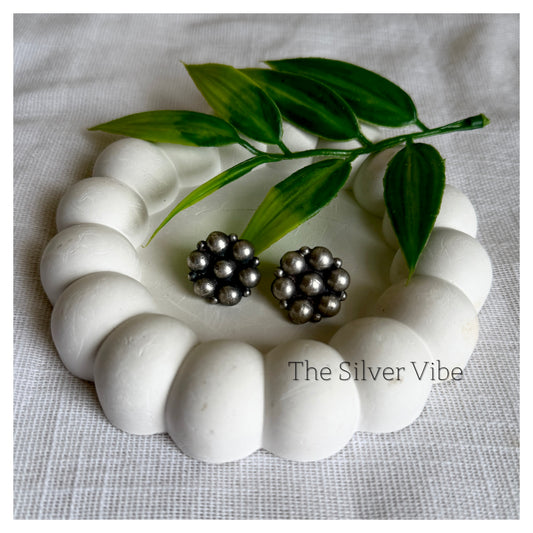 Black polished  floral studs TSV1094